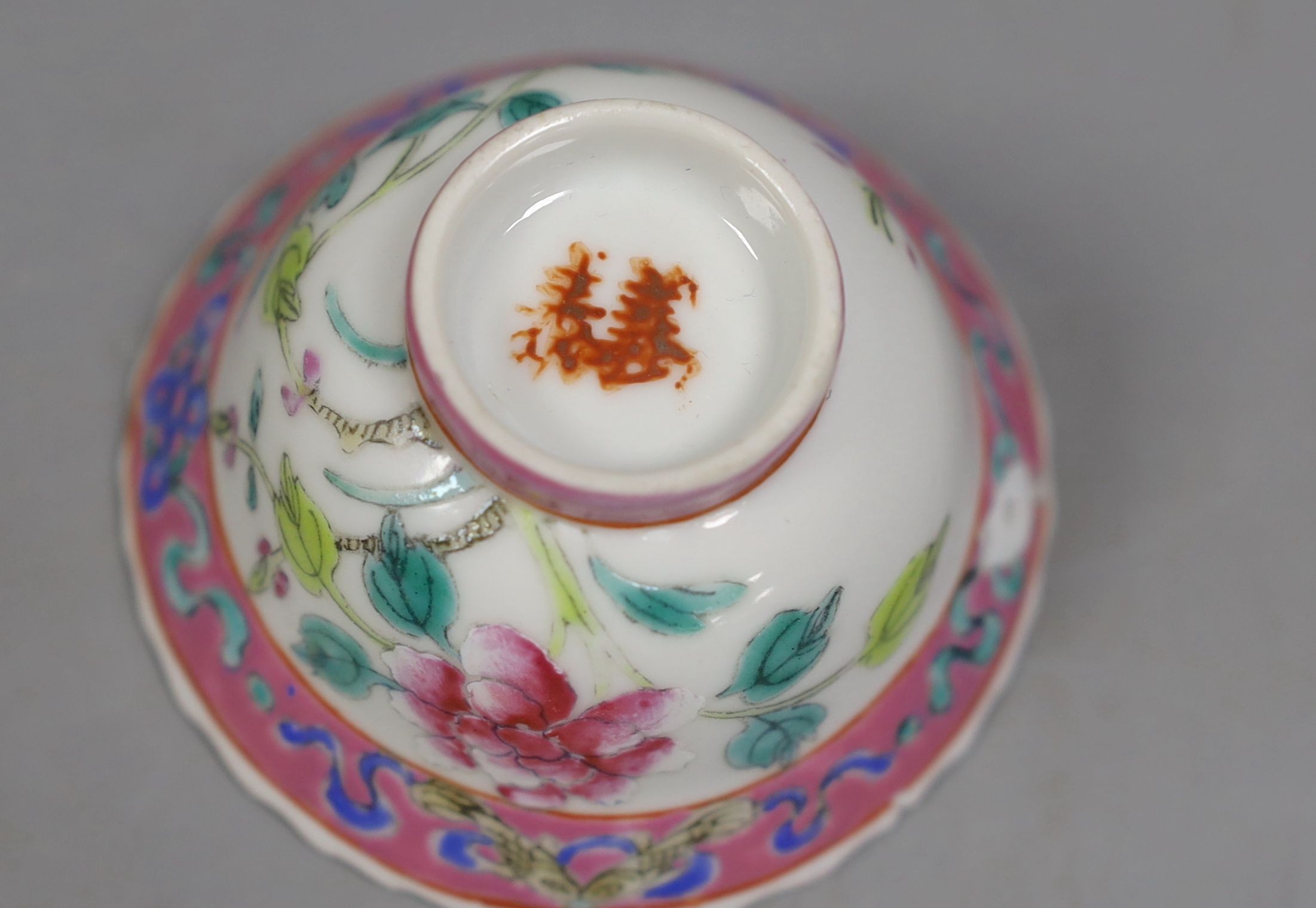 A Chinese Straits famille rose tea bowl, 7 cms diameter.